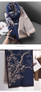 Detail of elegant branch print on blue imitation cashmere scarf with tassel edges