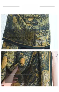 Macro shot of abstract oil painting scarf showing fine knit texture and neat edge stitching