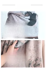 Close-up of artistic print scarf showing premium stitching and soft cashmere texture