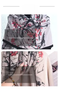 Detail of soft beige scarf featuring plum blossom print and high-quality knit texture