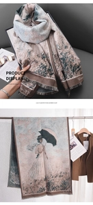 Detail of imitation cashmere scarf featuring Monet Impressionist umbrella painting print