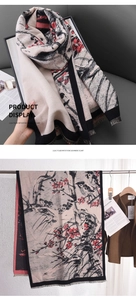Detail of artistic cashmere-feel scarf with ink plum blossom and bird print and tassels