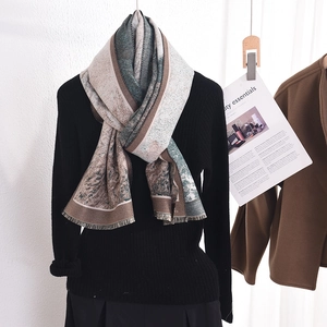 Elegant cashmere-like scarf with abstract landscape print and fringed edges for women