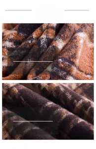 Detailed macro view of the soft plaid cashmere-like fabric texture in caramel and beige