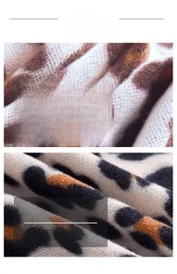 Close-up of leopard print knit fabric showing soft texture and fine stitching detail