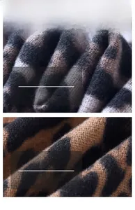 Macro detail of soft leopard print scarf fabric showing the high-quality knit texture