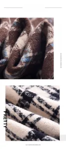 Macro detail of soft imitation cashmere scarf showing blue plaid and houndstooth texture