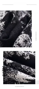 Macro view of black and white floral pattern on soft imitation cashmere scarf
