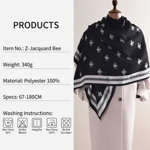 Écharpe élégante noire effet cachemire avec motif abeille jacquard et franges