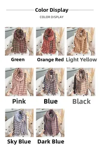 Detailed grid view showcasing eight color variants of the checkered scarf with tassels