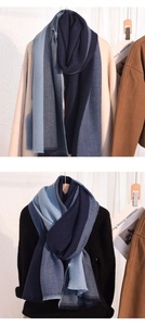 Detail of soft tricolor block cashmere-feel scarf in shades of blue with fringe