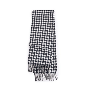 Classic black and white houndstooth cashmere scarf with fine tassel trim for autumn and winter