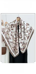 Detail of vintage floral print cotton linen square scarf with brown contrast hem