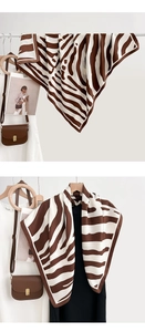 Detail of vintage zebra stripe silk square scarf showing soft texture and drape