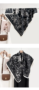 Close-up of black and white floral square silk scarf with elegant vintage botanical prints
