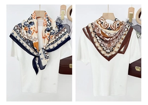 Detail of two stylish 90cm square scarves with paisley and vintage patterns on white shirts
