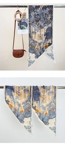 Détail d'écharpe en soie avec imprimé architecture rétro et forêt tropicale bleu et orange