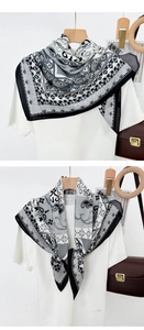 Detail of grey paisley floral square scarf styled on white shirt with two knotting ways