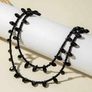 Gothic style double-layered black beaded necklace with faceted waterdrop pendants for women