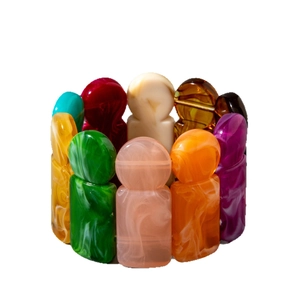 Colorful acrylic elastic bracelet with abstract human-shaped links and marble texture