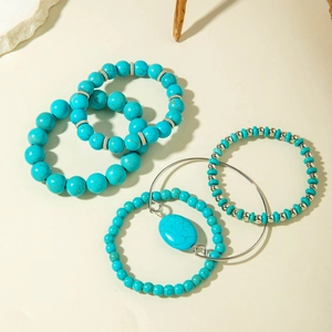 Five-piece bohemian turquoise bead bracelet set with silver engraved floral accents