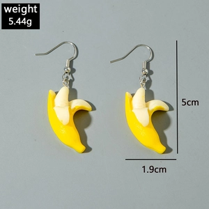 Detailed size view of creative mini banana earrings showing 5cm length and resin texture