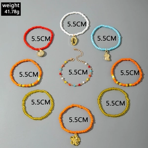 Bohemian colorful beaded bracelet set with shell and flower charms for beach vacation