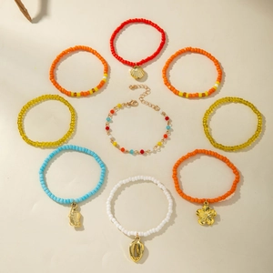 9pcs Bohemian colorful beaded bracelet set with seashell and flower charms for beach