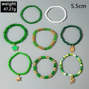 8-piece bohemian green beaded bracelet set with shell starfish and dolphin charms