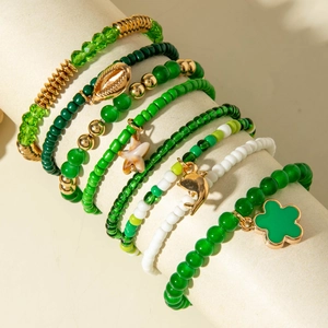 Bohemian multilayer green beaded bracelet set with seashell and dolphin charms
