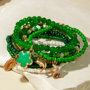 Bohemian layered beaded bracelet set with green flower, dolphin and starfish charms