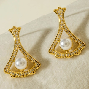 Elegant gold fan-shaped necklace and pearl earrings set with sparkling pavé crystals