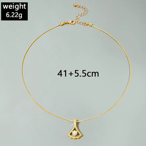 Detailed view of fan-shaped pearl necklace with pave zircons and snake chain details