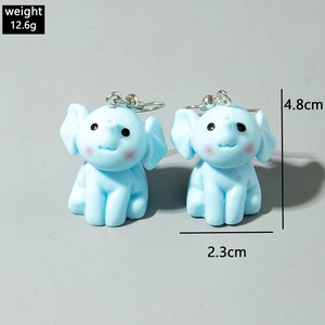Detail view of cute light blue elephant earrings with size dimensions and weight