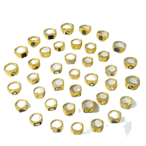 Set of gold alloy rings for men featuring black stones and sparkling crystal accents