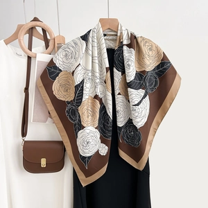 Elegant camellia floral silk scarf with color-block design in brown and champagne tones
