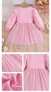 Close-up of pink long sleeve princess dress with mesh silver stars and lace details