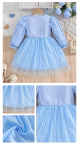 Detail of light blue girls' princess dress with silver star mesh tulle and ruffle cuffs