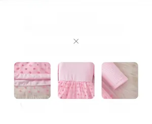 Detailed view of pink toddler dress with ribbed texture and polka dot mesh tulle skirt