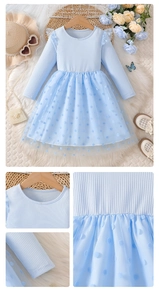 Detail view of light blue toddler dress with ribbed knit top and layered polka dot mesh skirt