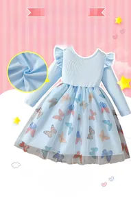 Detail of light blue girls dress featuring butterfly print mesh skirt and ribbed texture