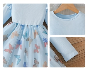 Detail of light blue girls' dress with knit bodice, ruffles and butterfly tulle skirt