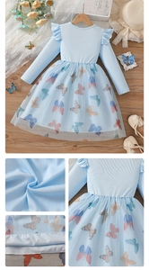 Detail of light blue girls' dress showing ribbed knit fabric and butterfly tulle skirt