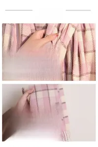 Detail of pink and white checkered scarf with soft texture and tassel edges