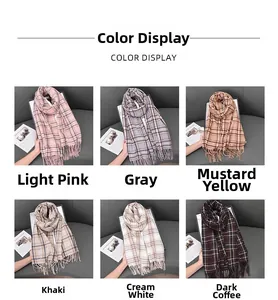 Detail view of plaid cashmere-feel scarves in six colors with elegant fringe trim