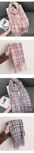 Detailed view of plaid imitation cashmere scarf with soft fringes and classic pattern