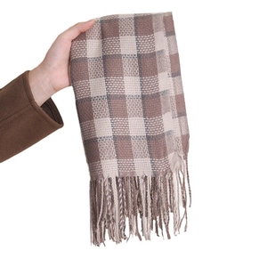 Brown and beige plaid check scarf with long tassels made of soft winter knit fabric