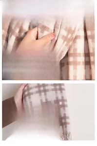 Detail of plaid scarf featuring long tassels and soft knit texture in beige and coffee