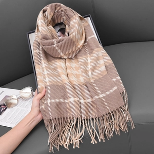 Classic houndstooth tassel scarf in beige and khaki cashmere-like fabric on grey leather