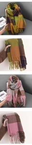 Detail of plaid tassel scarves in green and pink variants on a neutral sofa